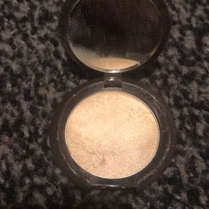 Mini Becca moonstone highlighter